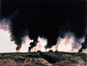 Photo of smoke clouds above a war zone.