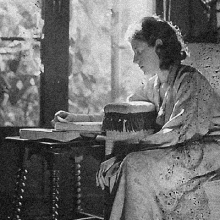 Sanora Babb Sitting at Desk, Black & White Photo