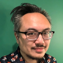 Iggy Cortez against Green Background